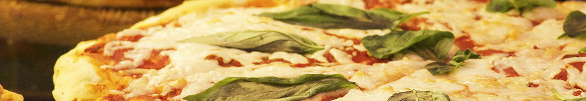 Eating Italian Pizza at Alphonso’s Pizzeria Trattoria restaurant in New York, NY.